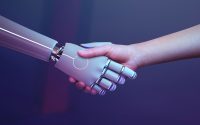 una mano humana saludando a una mano robótica